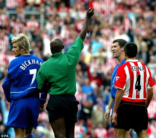 Rennie, pictured showing a red card to Roy Keane, was a highly respected figure in the game
