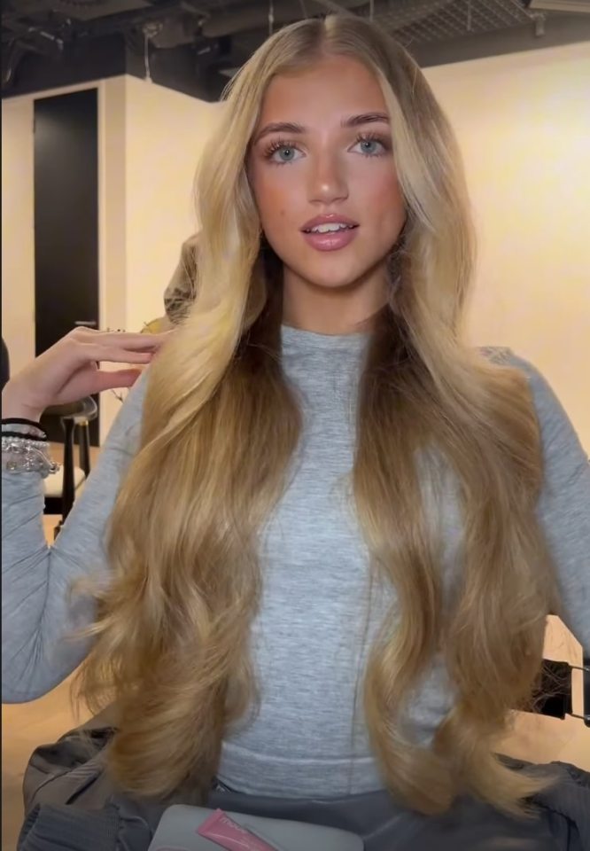 Princess Andre showing off her long blonde hair.