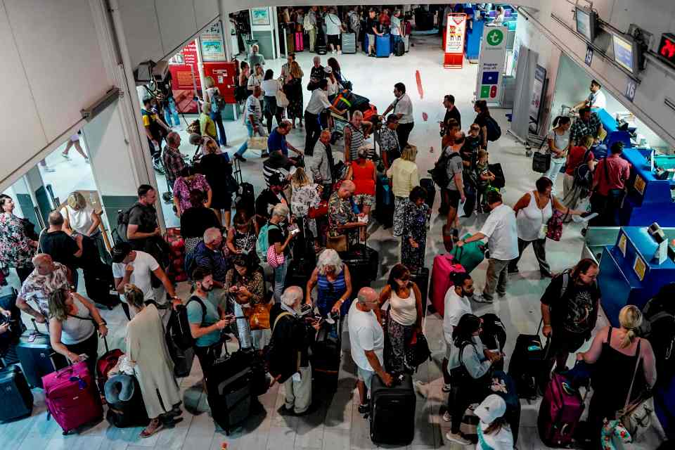 Stranded Thomas Cook passengers at an airport awaiting repatriation.