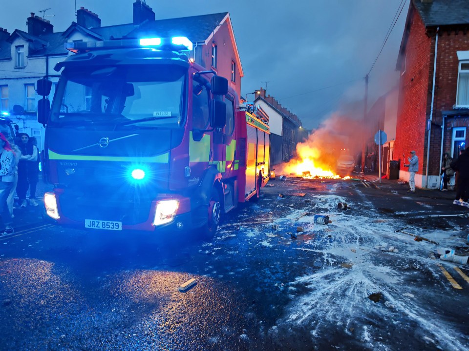 A fire truck at the scene of a protest where missiles were thrown at police.