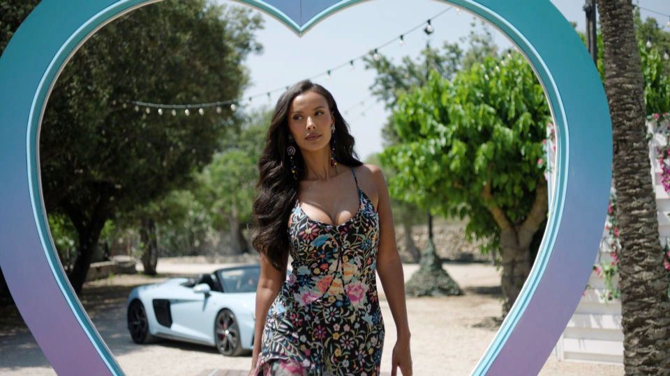 Maya Jama in a floral dress at the Love Island villa.