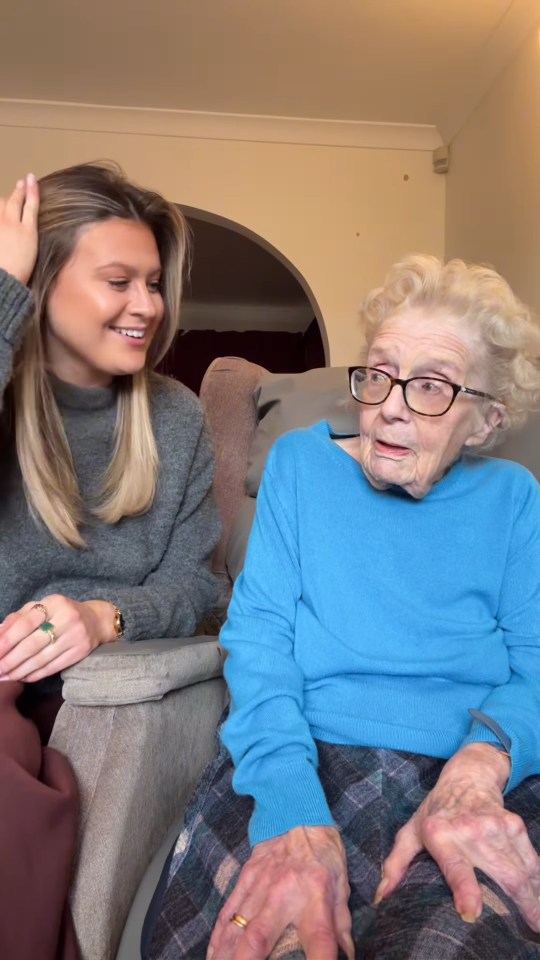 Norma and her granddaughter Jess sitting together.