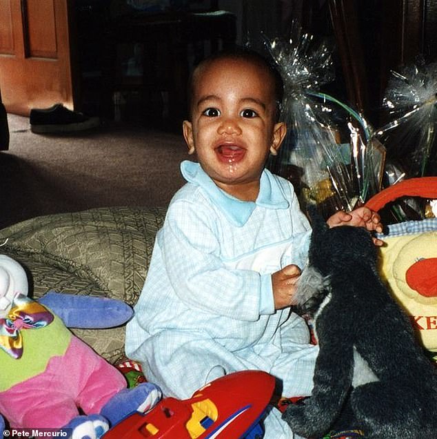 Pictured: Kevin playing as a baby around the age of 18 months. Recalling finding him as a newborn in the subway, Stewart says, ‘I thought the bundle was a doll and somebody must have left it there by mistake'