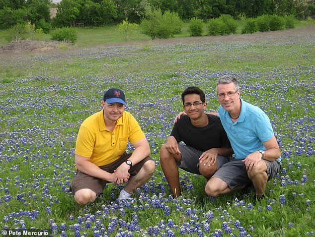 Pictured: Mercurio (left) with Kevin and Stewart when the boy was a teenager. In the days after he was born, police conducted a full investigation into who might have abandoned him. However, they failed to find any leads