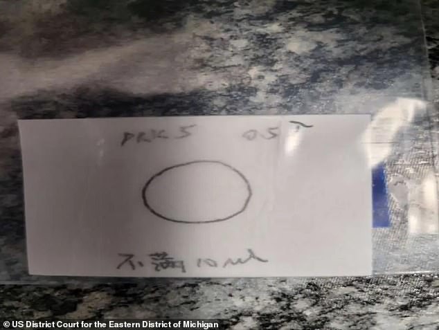 Police allege Han sent four packages which 'contained biological material related to round worms' from China to the US
