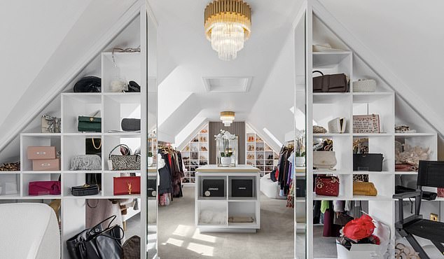 It was initially on for £1.5 million, but it¿s been dropped to £1,195,000 - a steep fall of 20 per cent (pictured the star's designer wardrobe)