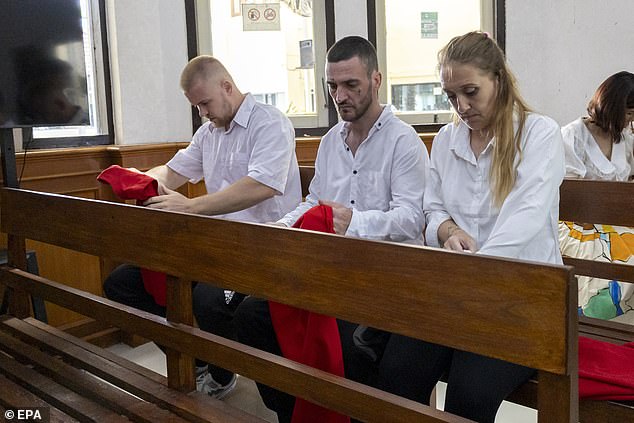 At one point during the trial they removed their red prison vests