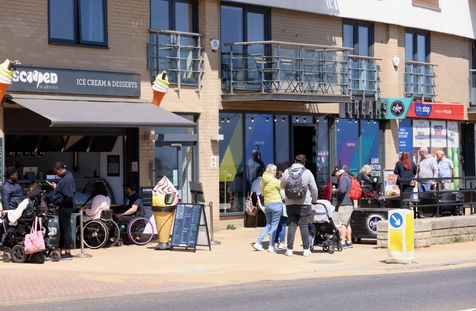 People outside Scarborough shops and cafes.
