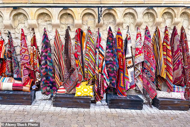 Like me, you can meander around the shops. Local artisans sell rugs and pottery