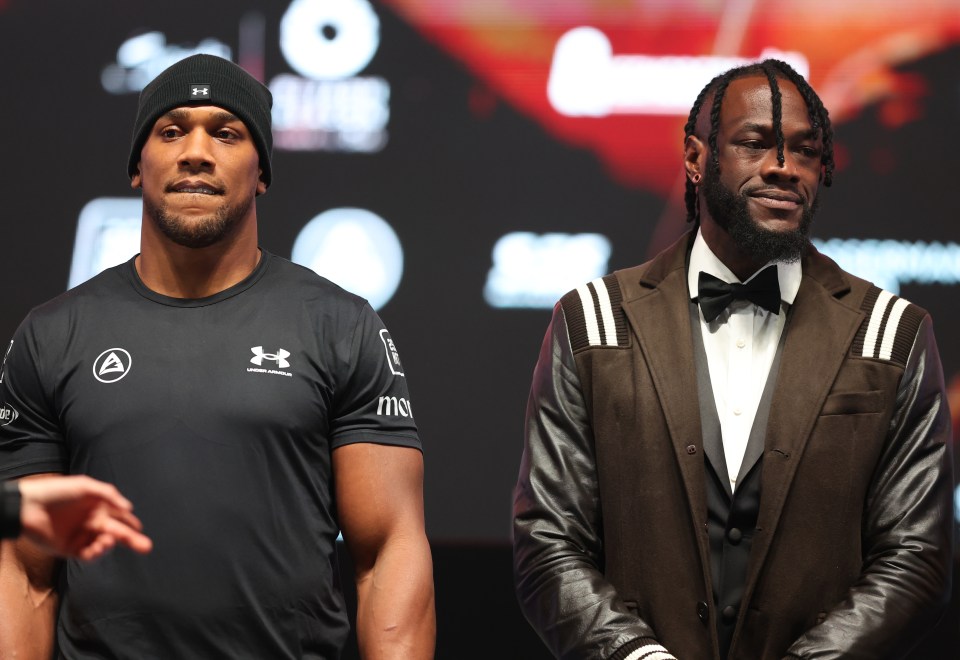 Anthony Joshua and Deontay Wilder at a press conference.