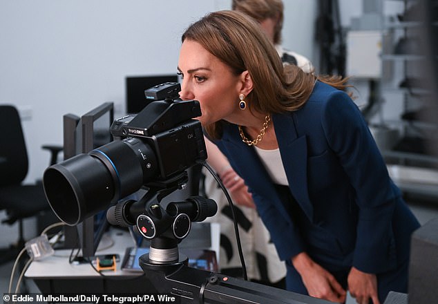The princess cut a trendy figure as she opted to rewear a chic trouser suit by designer Alexander McQueen for the event, along with a white scoop-neck top