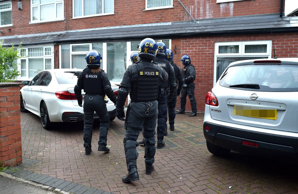Police raid in Bolton.