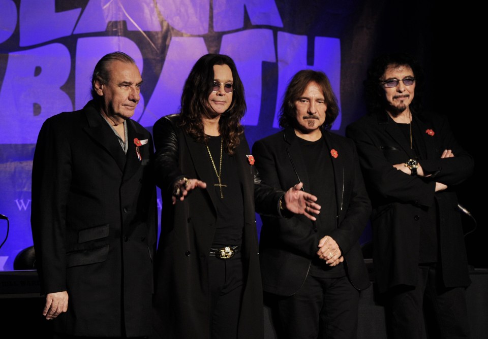 Black Sabbath band members at a press conference.