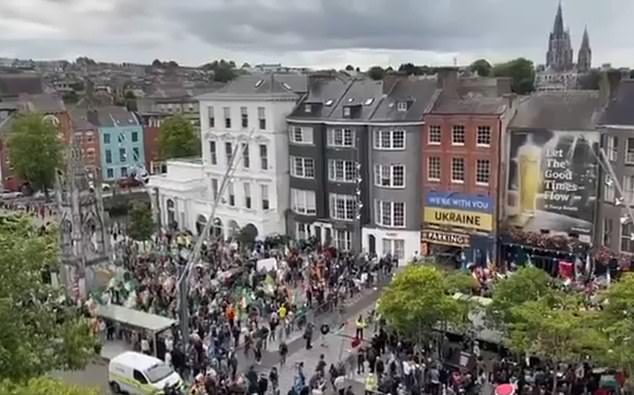 Pictures of the two protests showed how they were separated by a barrier