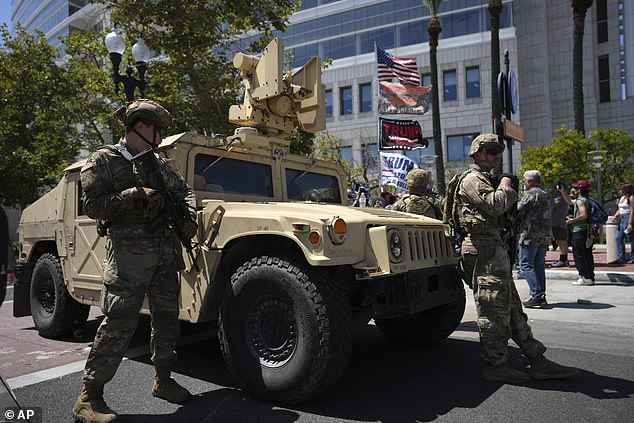 The National Guard and 700 Marines rolled into town late Monday following Trump's orders to regain control