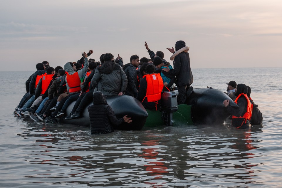 Migrants in a small boat in the English Channel.