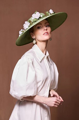 A soft green fine straw cut through with organza flowers