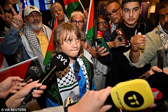 She was welcomed at Arlanda Airport in Stockholm by crowds waving Palestinian flags
