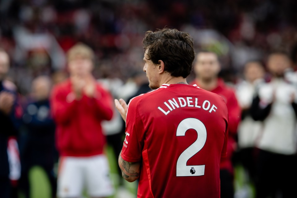 Victor Lindelof of Manchester United applauding fans.