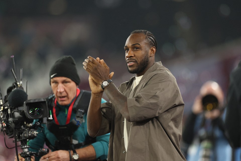 Michail Antonio applauding fans before a West Ham United soccer match.