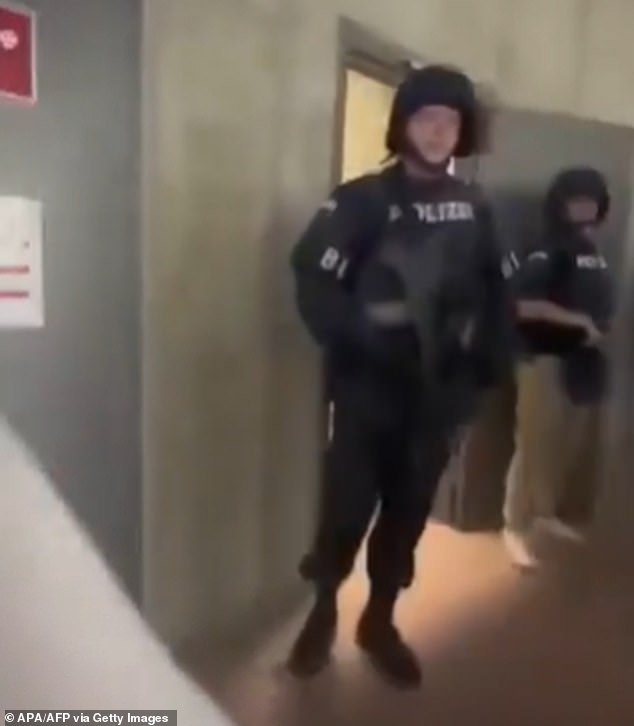 In the country's worst mass school shooting, terror-stricken pupils pretended to be dead as they cowered in corridors and two classrooms or ran for their lives. Pictured: Special forces descended on the high school shortly before 10am local time after reports of gunshots