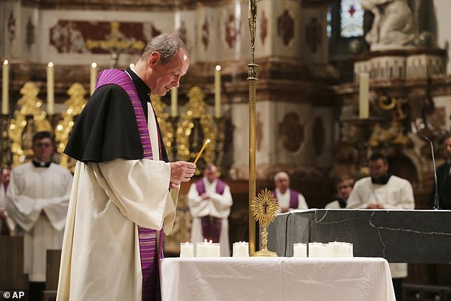 Last night Graz Cathedral held a service of reflection and the city's main square became a 'sea of lights' as candles were lit for the victims