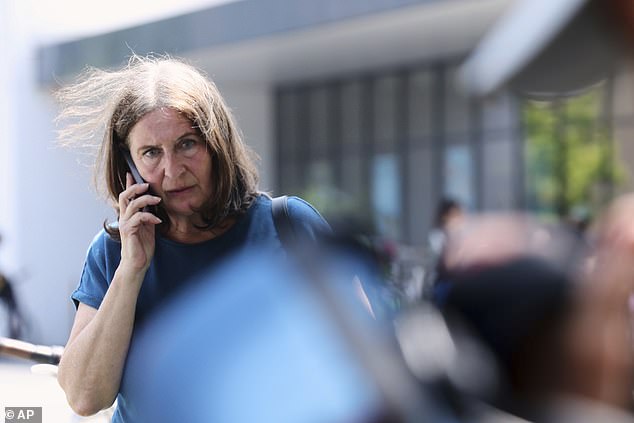 Graz mayor Elke Kahr called the incident 'a terrible tragedy'. Here she is pictured making a phone call after the shooting