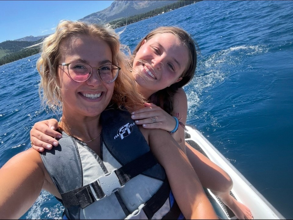 Two women on a jet ski.