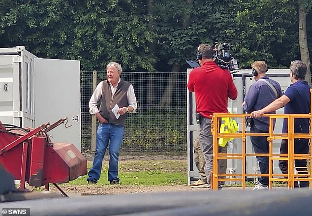 A large film crew was seen with Clarkson and Cooper as they attended the auction to sell his colossal £85,000 tractor