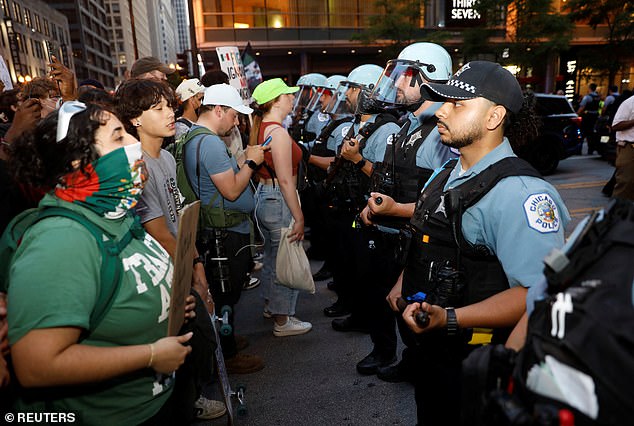 Thousands of protesters also took to the streets of downtown Chicago, vandalizing cars and clashing with police, while a driver crashed into a group of protesters in the city's Loop