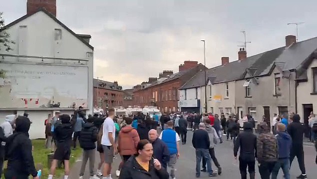 Tensions have risen in Ballymena again this evening as riot police warned force will be used if the crowd does not disperse