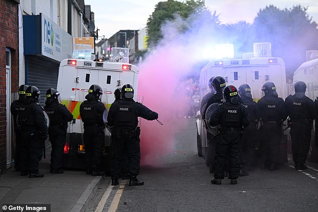 Police are calling the riots 'racist thuggery' as riot officers clash with protesters
