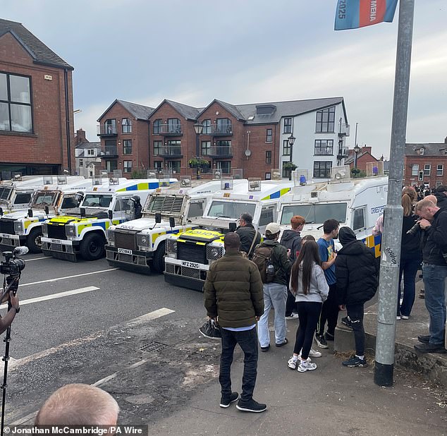 Riot police block a road in Ballymena during a third night of violence in the area