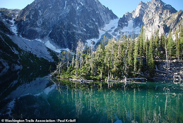 Authorities are increasingly confident they’re closing in on Travis after a hiking party reported seeing an 'ill-equipped' man actively avoiding contact on a trail at Colchuck Lake
