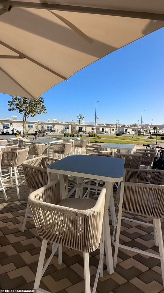 Shots of Neom in its infancy, which is just a camp at present for staff working on the development and their families, show the purpose built homes, cafes and parks