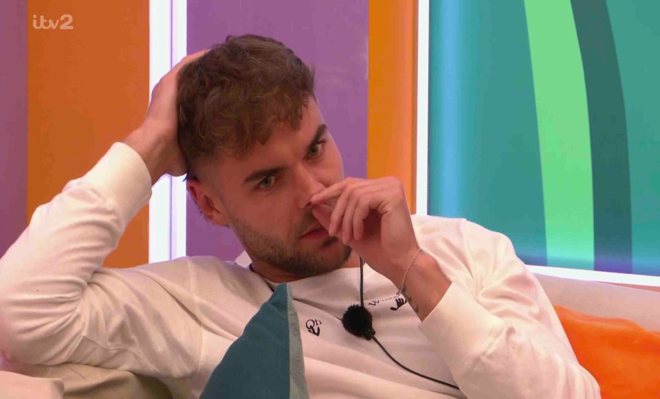 Man looking upset on Love Island.