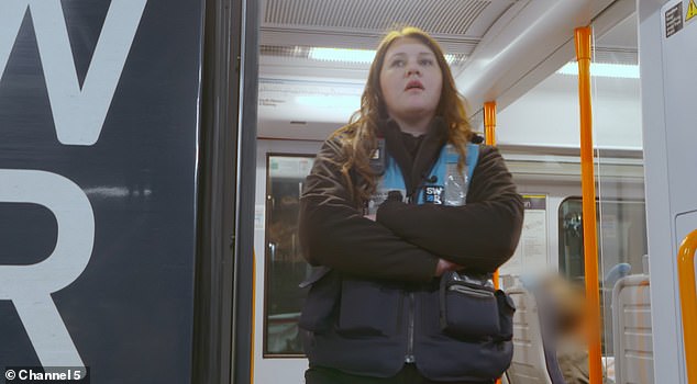 Lauren stands on the train at Weymouth after dealing with more passengers not buying tickets