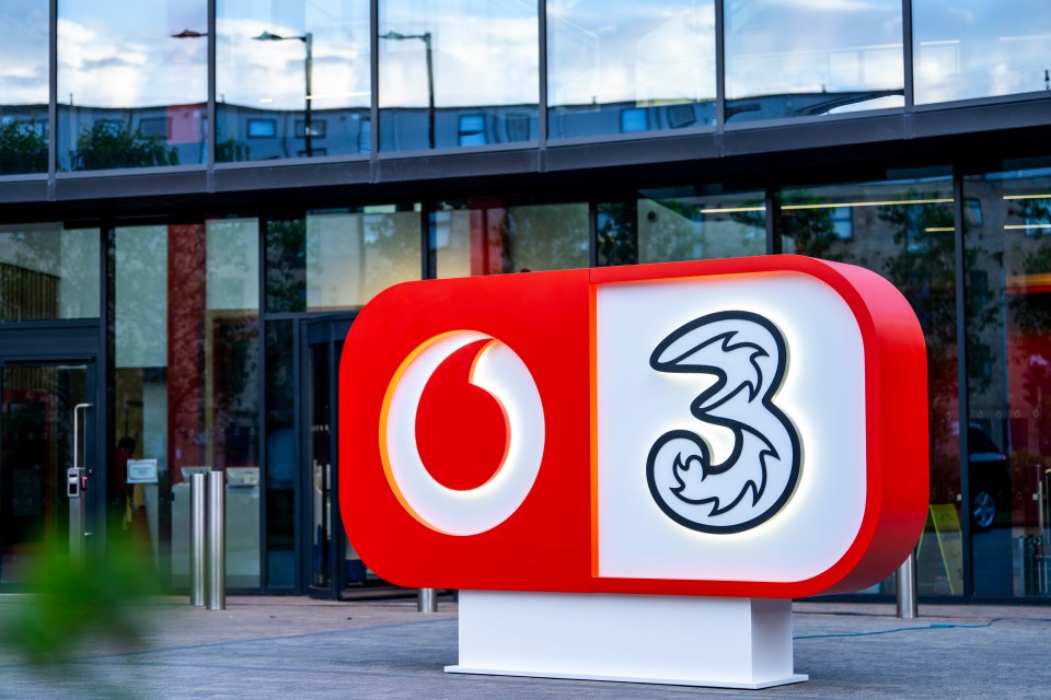 VodafoneThree logo outside a building.