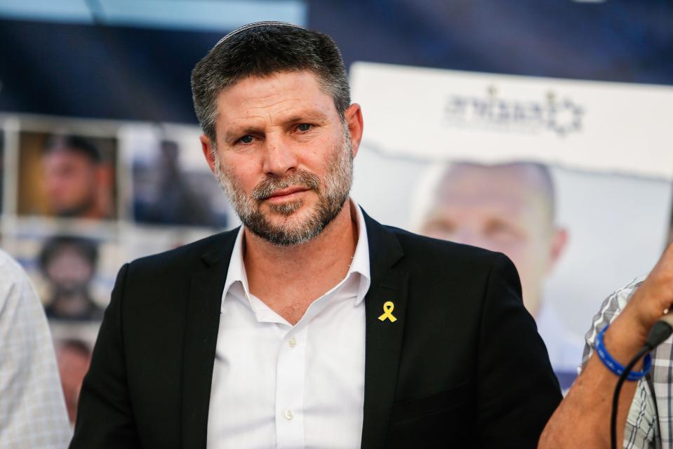 Israel's Finance Minister Bezalel Smotric addressing relatives of Israeli hostages.