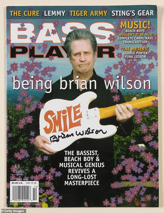 Brian Wilson's Fender Precision Bass used by Wilson throughout his very successful 2004 "SMILE" world tour and then donated to Heather Mills McCartney's charity "Adopt A Minefield" is featured on a magzine cover and seen ahead of todays Pop Memorabilia auction held at Christie's South Kensington on May 5, 2005 in London