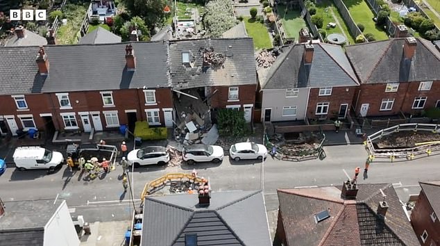 The entire front of the house collapsed and roof panels were sent flying