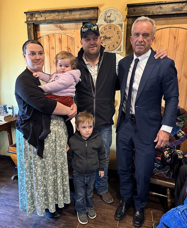 US health secretary Robert F Kennedy Jr with Daisy's parents, Peter and Eva Hildebrand, and two of their other children - whom Peter insists will still not be given the measles jab