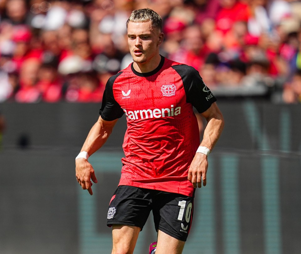 Florian Wirtz of Bayer 04 Leverkusen dribbling the ball.