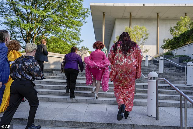 Tara Hoot, Maria Con Carne, Ricky Rosé and Vagenesis walk the steps of the Kennedy Center as they protested President Donald Trump's appearance at the performing arts venue on Wednesday, the opening night of Les Miserables