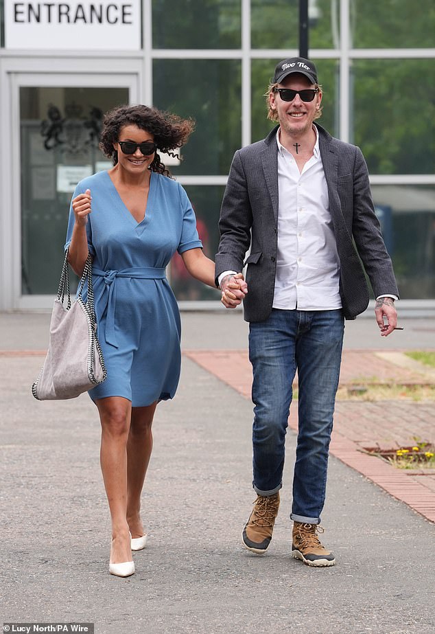 Former GB News presenter Laurence Fox and his partner Elizabeth Barker at Woolwich Crown Court in London