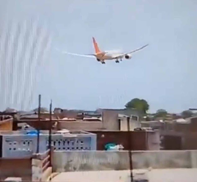 The plane is seen descending rapidly with landing gear deployed seconds before erupting in a fireball