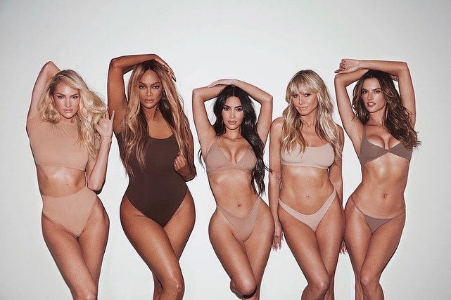 Kim Kardashian's SKIMS ad campaign featuring five models in nude-toned underwear.
