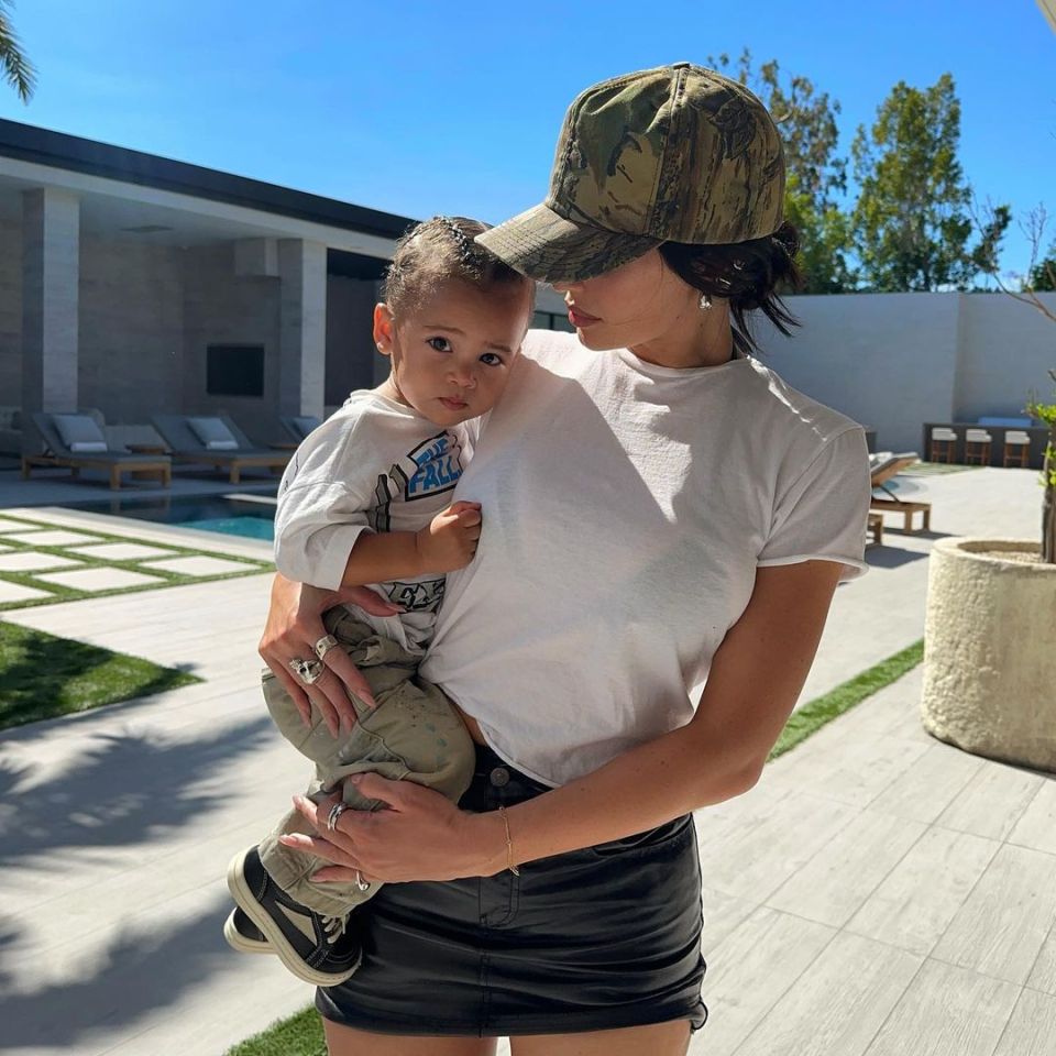 Kylie Jenner holding her son, Aire.