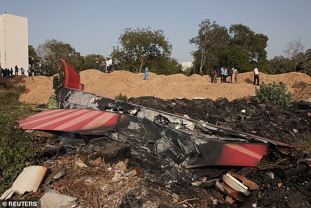 Wreckage of a Boeing 787 Dreamliner lies at the site where the Air India plane crashed in Ahmedabad, India, June 12, 2025