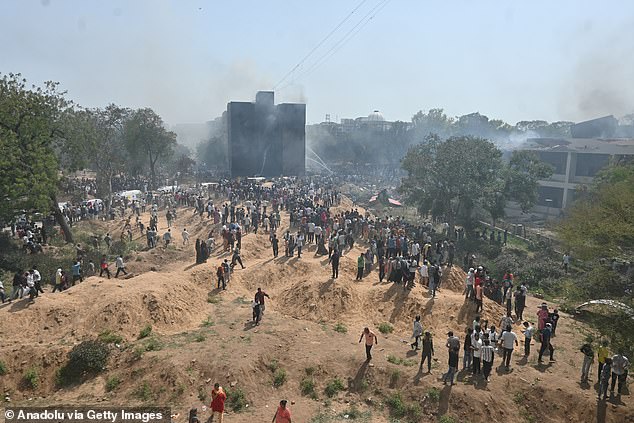 A view of the site where a plane crashed shortly after takeoff from Sardar Vallabhbhai Patel International Airport in India's western state of Gujarat on June 12, 2025